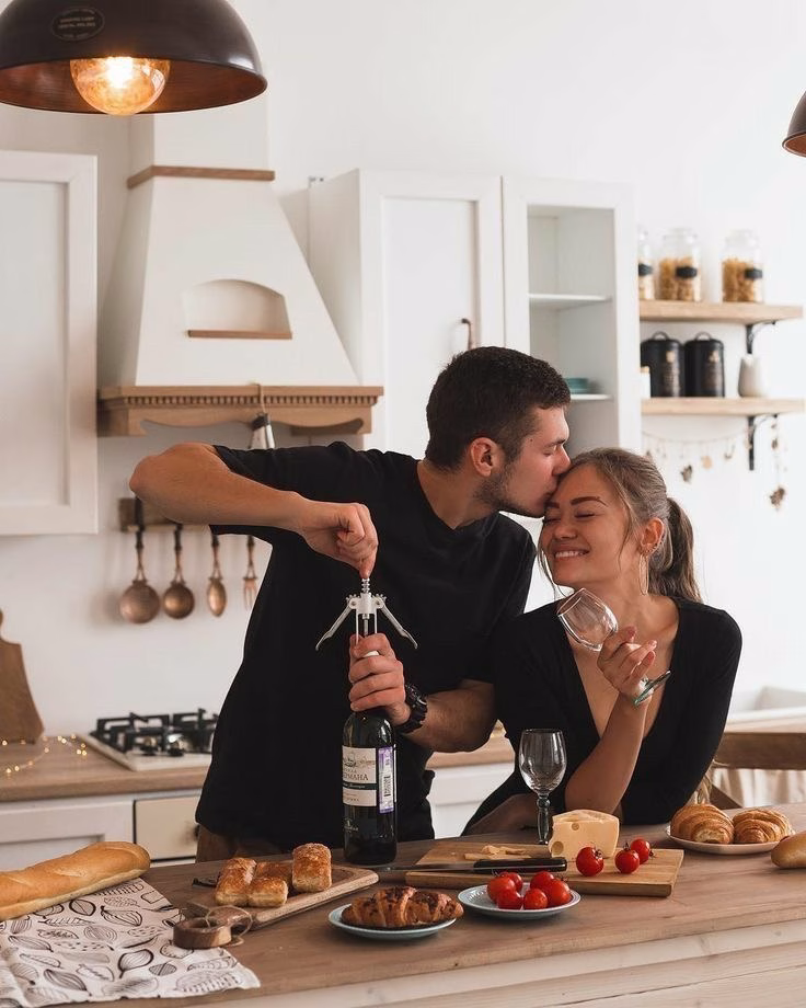 First Home Buyers in WA celebrate in the kitchen of their new home after accessing the Home Guarantee Scheme with their mortgage broker perth